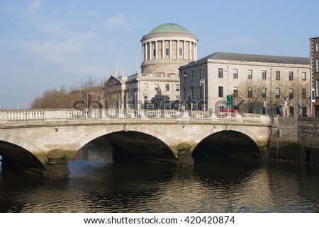 City of Dublin in Ireland, O'Donovan Rossa Bridge on River Liffey, Four Courts in the background