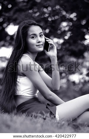 Portrait of a asian woman with mobile phone