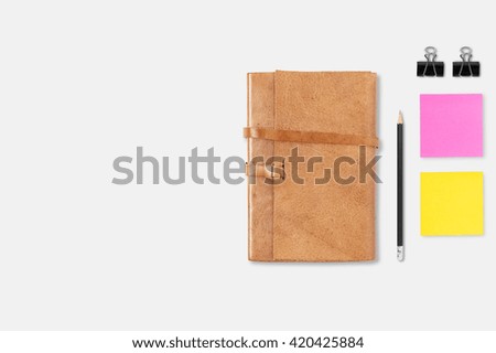 Brown Leather notebooks with pencil on white table background