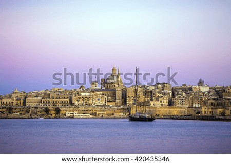 Malta - Valletta skyline with the St. Paul's Cathedral after sunset