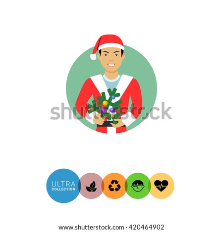Asian man holding Christmas tree