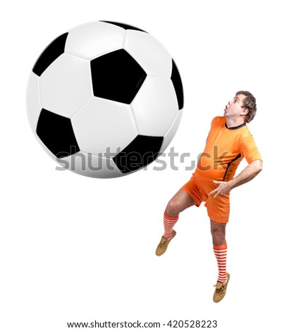 recreational fat footballer play with large ball isolated on a white background. Fat soccer player jumping at giant ball 