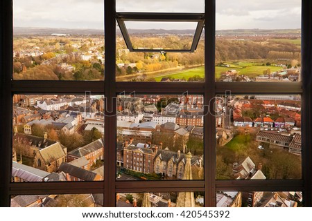 Open window to see top view of Durham city. This picture was taken on Durham tower which is a part of Durham Cathedral, England.