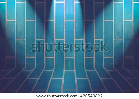 blue brick wall and three light spots.Vintage color