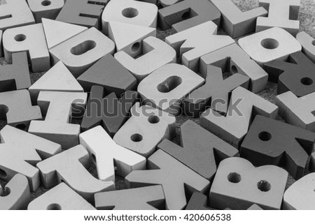 English alphabet wood  black  background