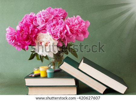 World Teacher's Day (still life with peony bunch,book pile on artistic background)