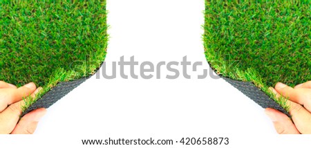Hand open artificial grass with copy space for text on white background (selective focus) Royalty-Free Stock Photo #420658873