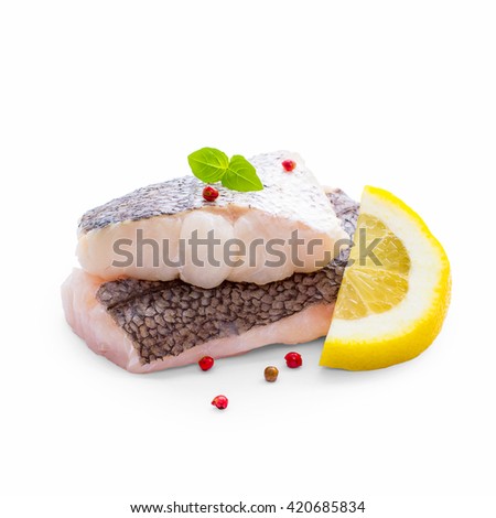Hake fillet with skin and lemon, isolated