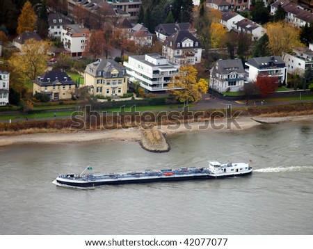 A ship on the river Rhein in the villas quarter of Bonn Royalty-Free Stock Photo #42077077