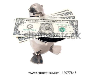 penguin bearing gifts of limited edition legal tender us dollar notes with santa's picture