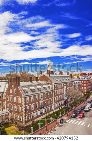 Aerial view on John F Kennedy Street in Harvard University Area in Cambridge, Massachusetts, USA. Eliot House white belltower seen on the background.