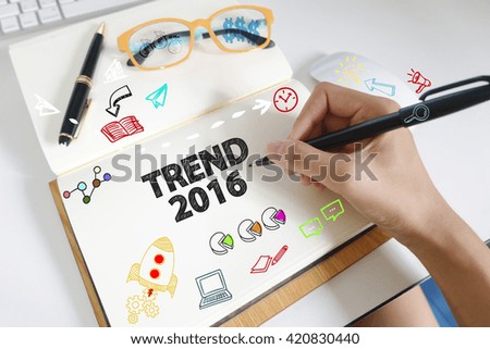 drawing icon cartoon with TREND 2016  concept on paper in the office 