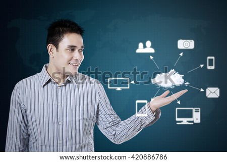 Asian man showing cloud computing diagram, technology connectivity concept