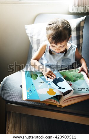 Girl Kid Child Reading Book Concept