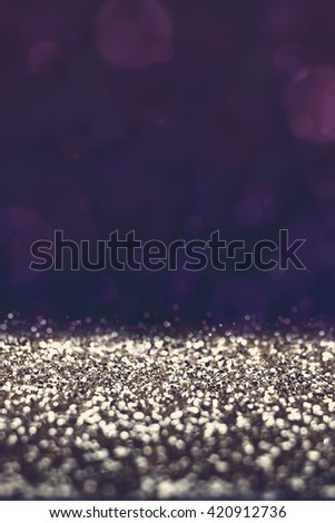 Empty silver glitter with blur purple background,texture background,Leave space for display of product