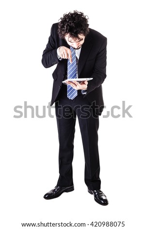 a young and handsome businessman holding a tablet isolated over a white background