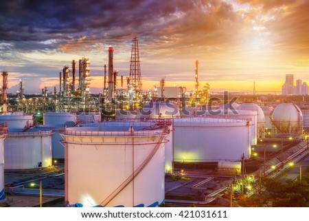 Oil refinery industry  at sunset - factory - petrochemical plant Royalty-Free Stock Photo #421031611