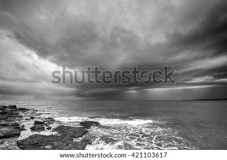 Storm is about to hit the coast of Croatia. Landscape photo of a beach and dramatic thunderstorm clouds over the sea or the ocean.