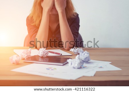 Young business woman tired and worry about work. Royalty-Free Stock Photo #421116322
