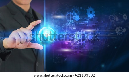 Businessman holding glowing globe with Social media icons.