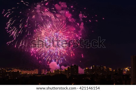 bright fireworks over the night city