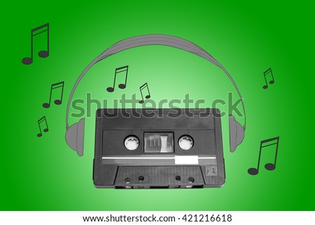 Audiotape and headphone draw on green background