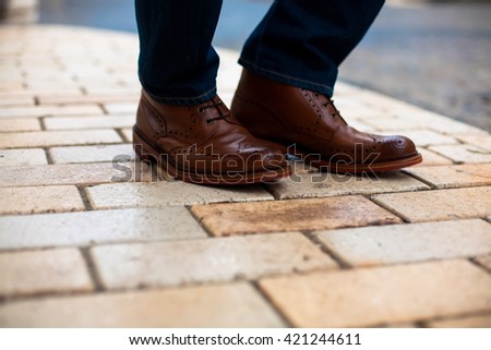 men man shoes street city
