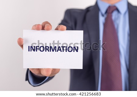 Man showing paper with INFORMATION text