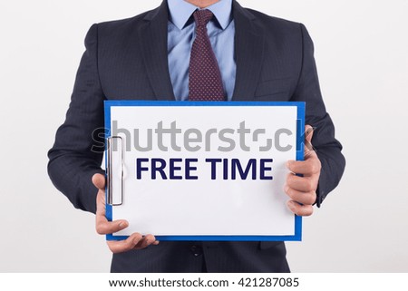 Man showing paper with FREE TIME text