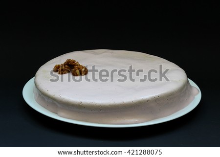 Sweet homemade carrot cake. Close up carrot cake with whipped frosting. Shallow depth of field.