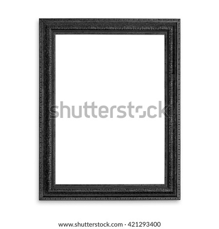 Old black blank picture frame isolated on white background.