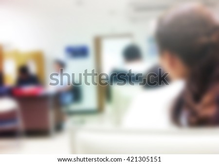 blurred background of people waiting for doctor in hospital