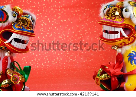 traditional chinese dancing-lion on a festive background,the lion is believed to be able to dispel evil and bring good luck and prosperity in China.
