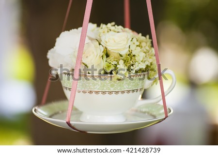 wedding decor cup with flowers