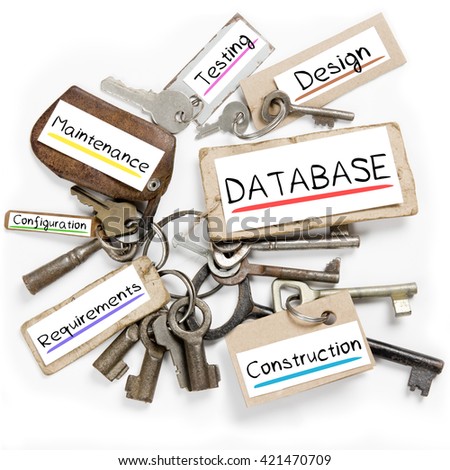 Photo of key bunch and paper tags with DATABASE conceptual words