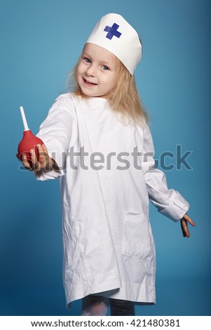 little funny girl playing nurse
