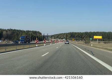 Image of Road signs in a highway on reconstruction