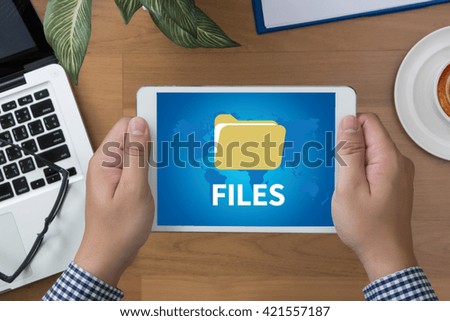 FILES man hand Tablet and coffee cup