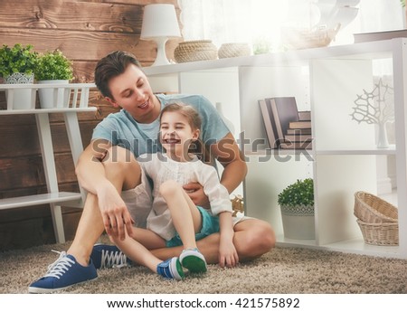 Happy loving family. Father and his daughter child girl playing together. Father's day concept.