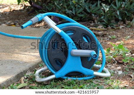 Rubber tube for watering plants in the garden.
