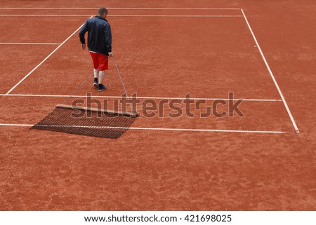 Preparing for the game of tennis court