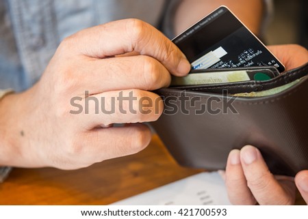 credit card in wallet. Royalty-Free Stock Photo #421700593