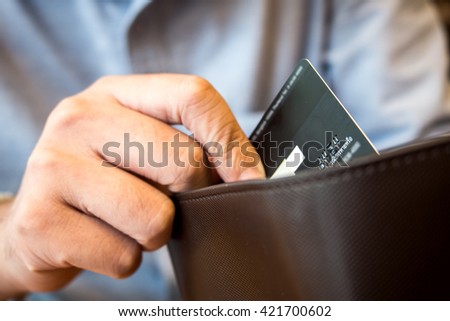 credit card in wallet. Royalty-Free Stock Photo #421700602