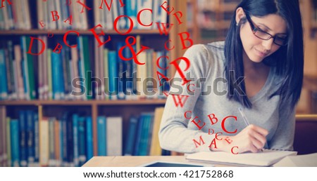 Letters on a white background against woman studying in the library