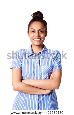 Portrait of smiling young lady standing with her arms crossed against white background