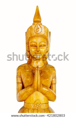 woman statue wooden craft Thailand style making sawasdee, sawassdee is hello sign in Thailand.