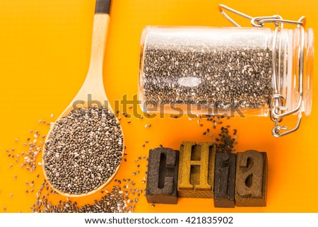 Healthy Chia seeds with chia wooden sign close-up.