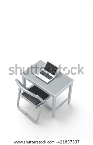 Miniature laptop on the office table on white background.