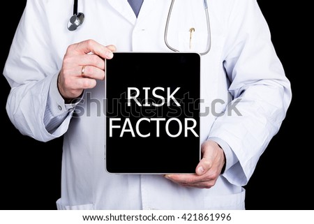 technology, internet and networking in medicine concept - Doctor holding a tablet pc with risk factor sign. Internet technologies in medicine