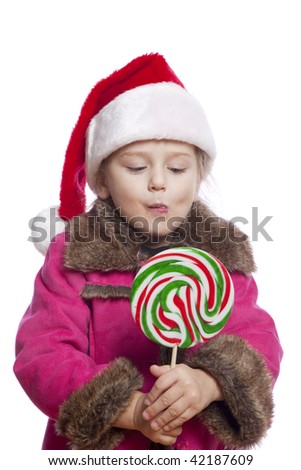 Little Beautiful Girl with big candy on white isolated
